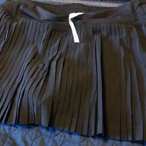 Black plaited Skirt, New without tags.